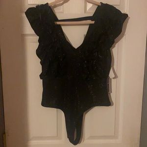 Black sparkly body suit
